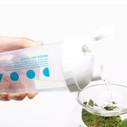 ADA DOOA Glass Pot SHIZUKU naplnění víčka za pomocí šejkru DOOA water softener<br><em>Ilustrační obrázek - může obsahovat dekorace, další produkty a vybavení, které nejsou součástí a musí se dokoupit samostatně.</em>